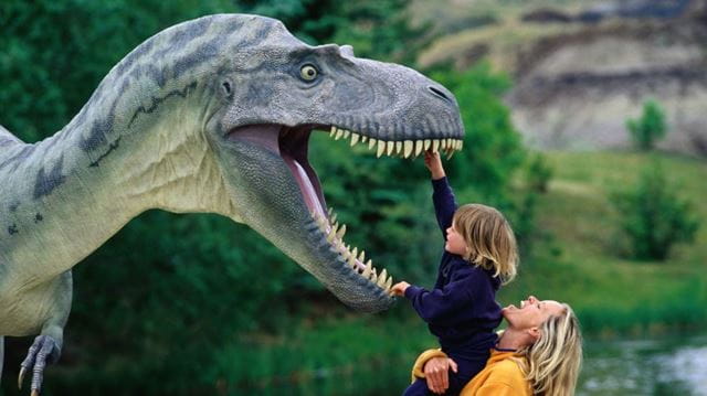 Mother and child with dinosaur